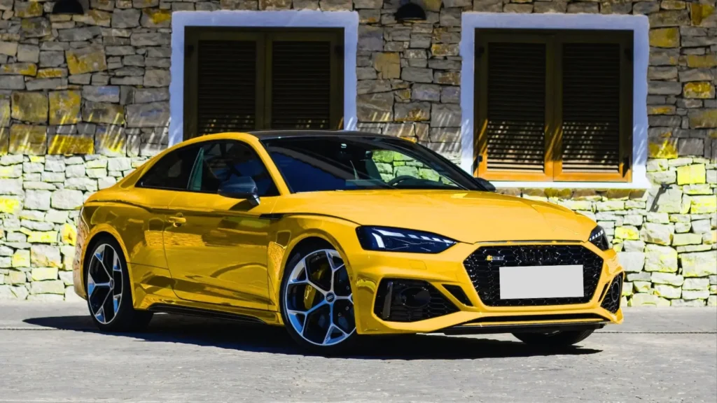 Front view of Audi RS5 with aggressive honeycomb grille